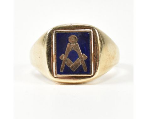 A hallmarked 9ct gold Masonic reversible swivel signet ring. The 9ct gold signet ring having a cushion shaped head with rever