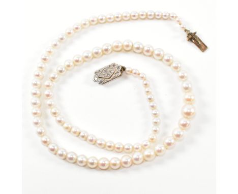 A 9ct gold, cultured pearl and diamond necklace. The necklace having a single row of graduated cultured pearls strung on stri