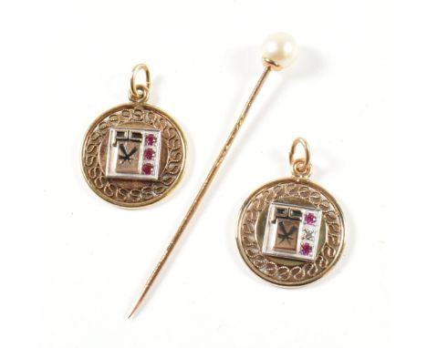 A 9ct and pearl stick pin together with two 12ct Gold filled service medals set with synthetic ruby and diamond. The Stick pi