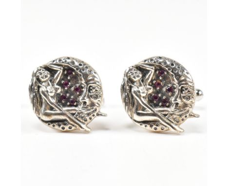 A pair of sterling silver maiden and moon cufflinks set with synthetic ruby. Marked Sterling. Measures head 2cm.&nbsp;All wei