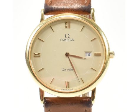 An 18ct gold Omega De Ville wrist watch. The Omega watch having gold mixed Roman and stick indices, leaf hands and quick set 