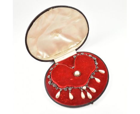 A cased 19th century Victorian cut steel and simulated pearl festoon necklace and brooch parure . The necklace strung with sc