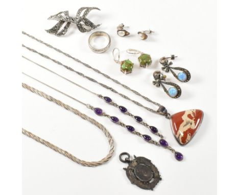 A collection of 925 silver and marcasite jewellery. The collection to include a&nbsp;hallmarked Italian silver three tone twi