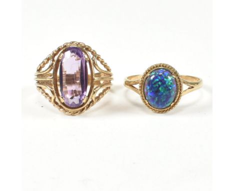 A hallmarked 9ct gold and amethyst ring and a hallmarked 9ct gold and synthetic opal ring. The dress rings to include a hallm