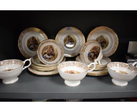An English fine bone China tea service, decorated with London street scene with gold embellishment border, ( 18 ).