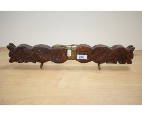 A mid / late 20th century Indian carving set, carved depicting a double headed dragon on brass mounts, impressed mark 'India'