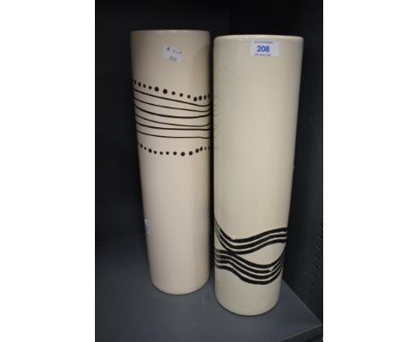 A pair of cylindrical ceramic vases, decorated having tribal patterns on a cream ground, h43cm