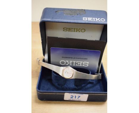 A Seiko stainless steel wristwatch, the octagonal silver dial having baton numerals, on a stainless steel bracelet strap, in 