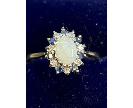 9ct Gold ring set with Opal, sapphires &amp; white stones Size Q 