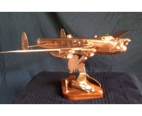 This spectacular creation was created by Seth Allen from a copper water tank  It is a 1/48 scale Lancaster with fully moving 