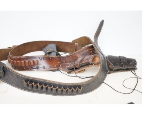 2 Leather ammunition belts & holsters & 1 additional holster 