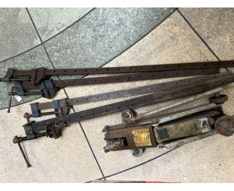 A set of four sash clamps together with a two tonne trolley jack
