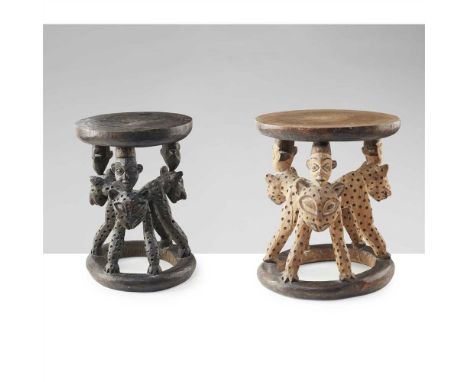 PAIR OF BAMILEKE STOOLS CAMEROON GRASSLANDS carved wood, both standing on ring bases with three carved leopard supports and h