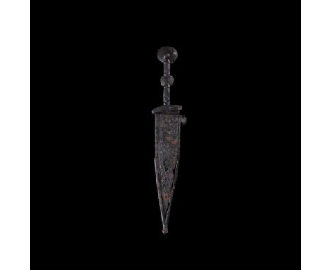 CELTIBERIAN "PUGIO" DAGGER AND SCABBARD IBERIA, 1ST CENTURY B.C. cast iron, the handle formed of two sections, held together 