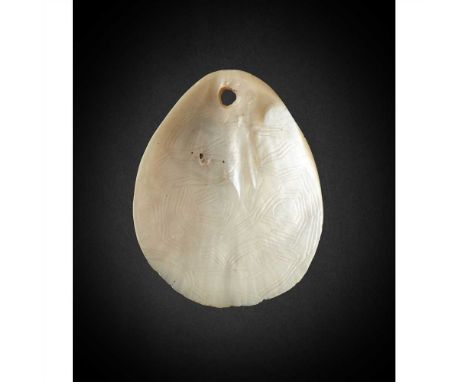 ABORIGINAL PENDANT, LONKA LONKA WESTERN AUSTRALIA carved pearl shell with incised decoration, pierced for attachment (Dimensi