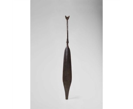 SHIPIBO PADDLE MID 19TH CENTURY, PERU carved wood, with crescent handle and long shaft with a prominent mid-rib leading to a 