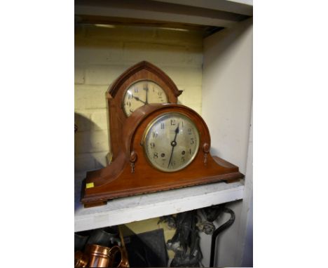 A 1930s mahogany Wellington clock,&nbsp;43cm wide; together with another early 20th century mantel clock, 34cm high. (2) 