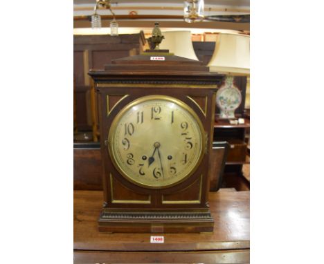 A late 19th century mahogany and brass bracket type clock,&nbsp;with 8in silvered circular dial, striking on two gongs, 50cm 
