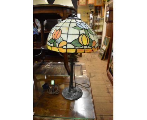 An Art Nouveau Tiffany style stained glass table lamp,&nbsp;56.5cm high.&nbsp; 