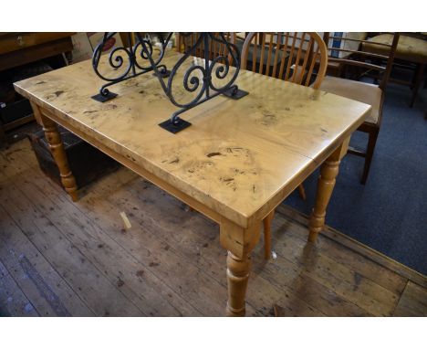 A good burr elm dining table and set of four burr elm &amp; ash stick back Windsor chairs,&nbsp;by Stewart Linford, with one 