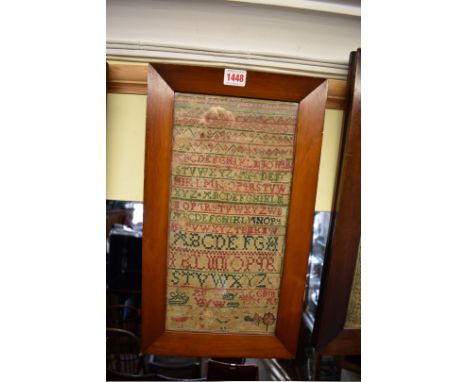 An 18th century alphabet sampler, dated 1735, 39 x 19cm.&nbsp;&nbsp; 