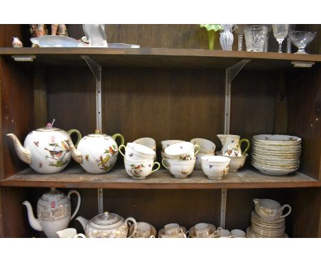 A Herend tea service, comprising: a large pot &amp; cover, 16cm high; a small pot &amp; cover, 14.5cm high; a milk jug; sugar