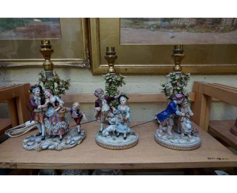 Three Capodimonte porcelain figural table lamps,&nbsp;largest 30cm high. 