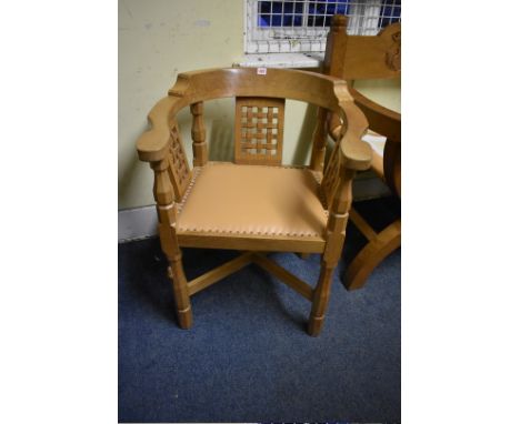 A Robert 'Mouseman' Thompson oak monk's chair,&nbsp;with lattice panels. 