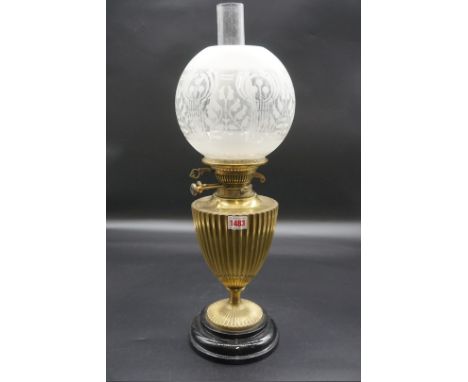 An antique brass oil lamp,&nbsp;height including shade 51cm.&nbsp; 