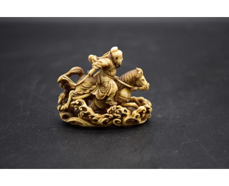 A good Japanese carved ivory netsuke,&nbsp;by Rakueisai, 19th century, depicting General Gentoku, signed, 5.8cm wide. For a n