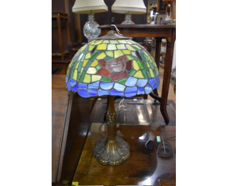 A Tiffany style&nbsp;stained glass table lamp, 68cm high.&nbsp; 