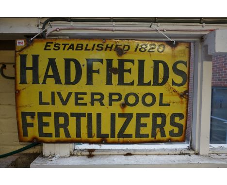 A vintage yellow enamel 'Hadfields Fertilizers, Liverpool' sign, 45.5 x 76cm.&nbsp; &nbsp; &nbsp;&nbsp; 