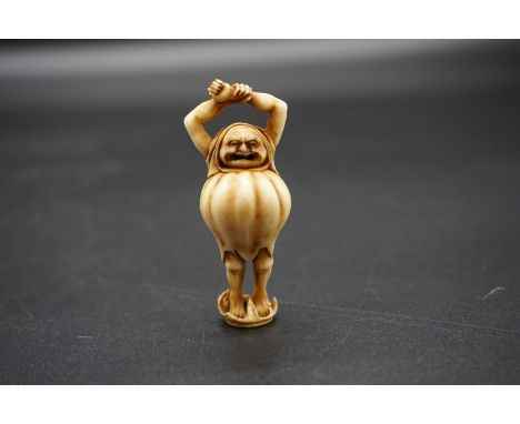 A good Japanese carved ivory netsuke,&nbsp;by Anraku, Edo, depicting Daruma awakening, signed, 5.4cm high. 