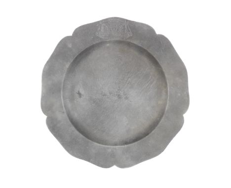 A George II pewter five lobed wavy edge plate, circa 1750The plain rim engraved with the arms and motto of TOWNSHEND, touchma