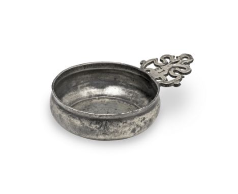 A rare William &amp; Mary pewter OEAS gill porringer, circa 1690The small bellied bowl with a flat base and shallow footring,