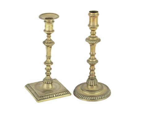 Two good George II/George III brass alloy socket candlesticks, circa 1760The first with waisted socket above a knopped stem a