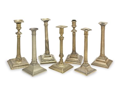 A rare George III brass alloy socket candlestick, circa 1760-80With loose nozzle and columnar stem cast with twelve flutes, a
