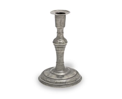 A rare and fine George III pewter candlestick, Newcastle-Upon-Tyne, circa 1760Having an unusual fixed sconce, a baluster stem