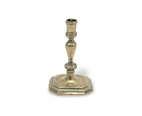 A fine and small brass socket candlestick, French, circa 1745-9With punched C couronné duty mark to footrimThe facetted octag