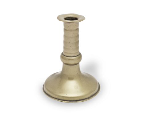 A fine and rare late 17th century small brass alloy 'ball-knop' trumpet-based socket candlestick, English, circa 1675With cor