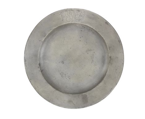 A George II pewter plain rim plate, circa 1750The rim engraved with a coat of arms, 'quarterly, first and fourth, azure, a li