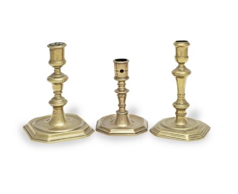 A William &amp; Mary/William III brass alloy socket candlestick, circa 1690-1700With a moulded socket topping an acorn- and d