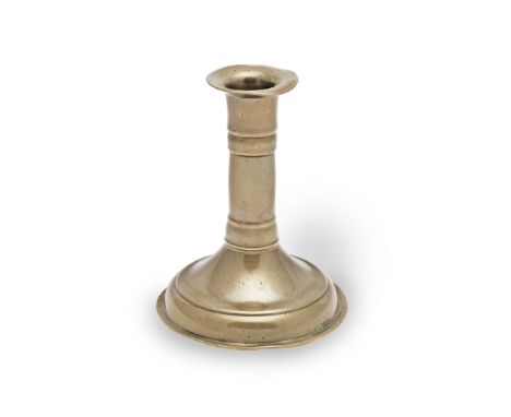 A good and small late 17th century trumpet-based socket candlestick, English, circa 1690With flared socket flange above a ste
