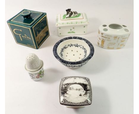 A group of china including a Harrods toothbrush holder, a Thomas Goode &amp; Co tea caddy by Caverswall etc. 