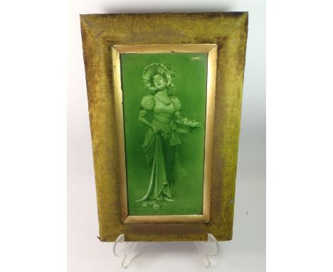 A Sherwin and Cotton green glazed tile printed lady with basket of roses, 29 x 14cm 