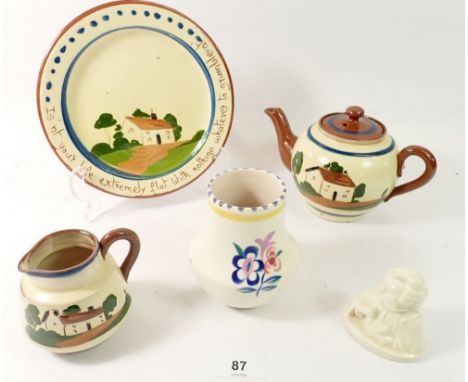 A Doulton Buzfuz bust, a Poole vase and a Torquay Ware teapot, jug and plate 