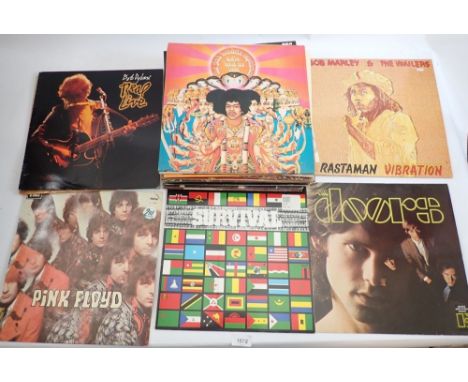 A group of vinyl records mainly rock including David Bowie, Bob Dylan, Pink Floyd etc. 