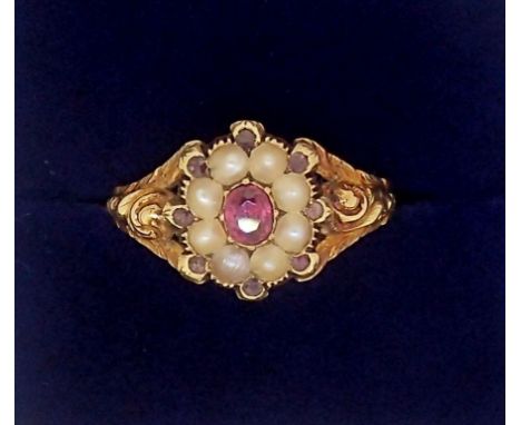 A Victorian gold cluster ring set ruby, amethysts and seed pearls, 2.4gm size N, unmarked but tested as 18 carat gold - cased