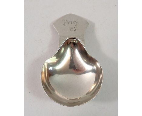 A silver caddy spoon, Chester 1918 engraved 'Pansy 1925' 