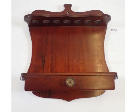 An Edwardian mahogany wall pipe rack and drawer, 29 x 25cm 